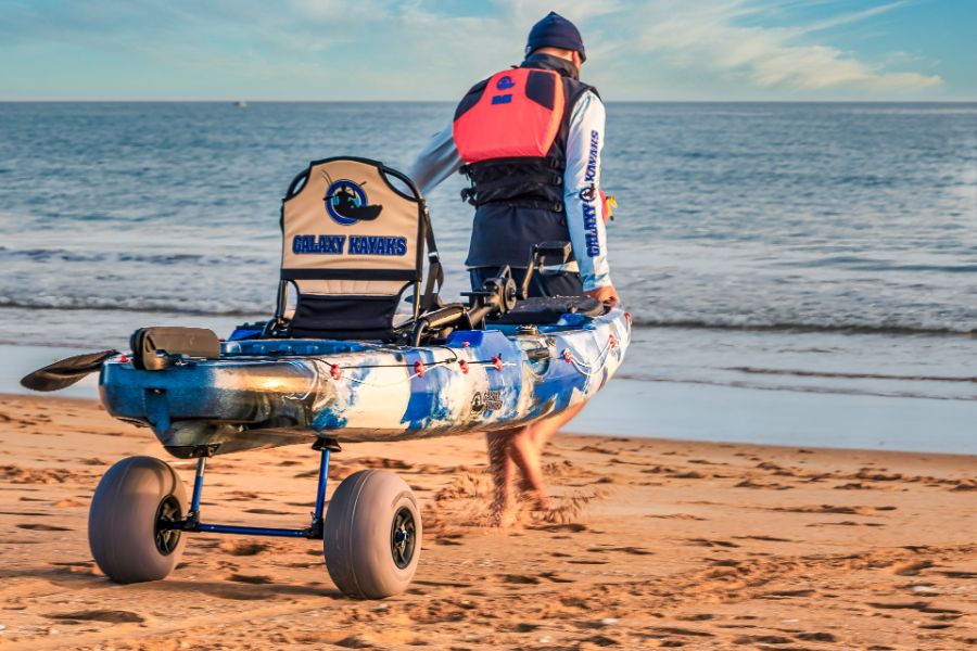 Transport trolley for a fishing kayak