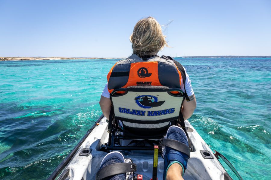 Person paddling for the first time on a Galaxy recreational kayak
