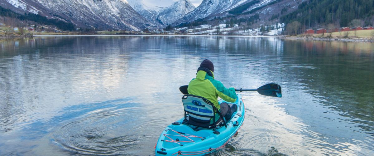 Family paddling a Galaxy 2+1 recreational kayak